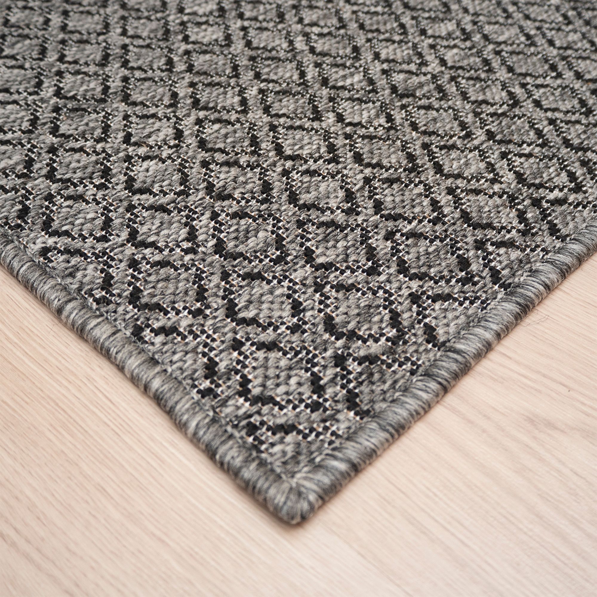 Käpy käytävämatto Rulla - musta.