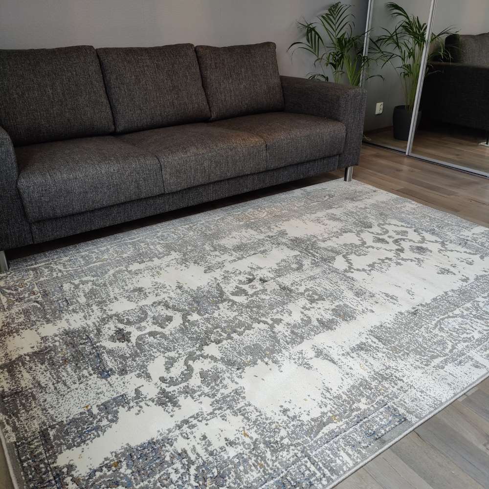 Lamme lyhytnukkainen matto - harmaa.