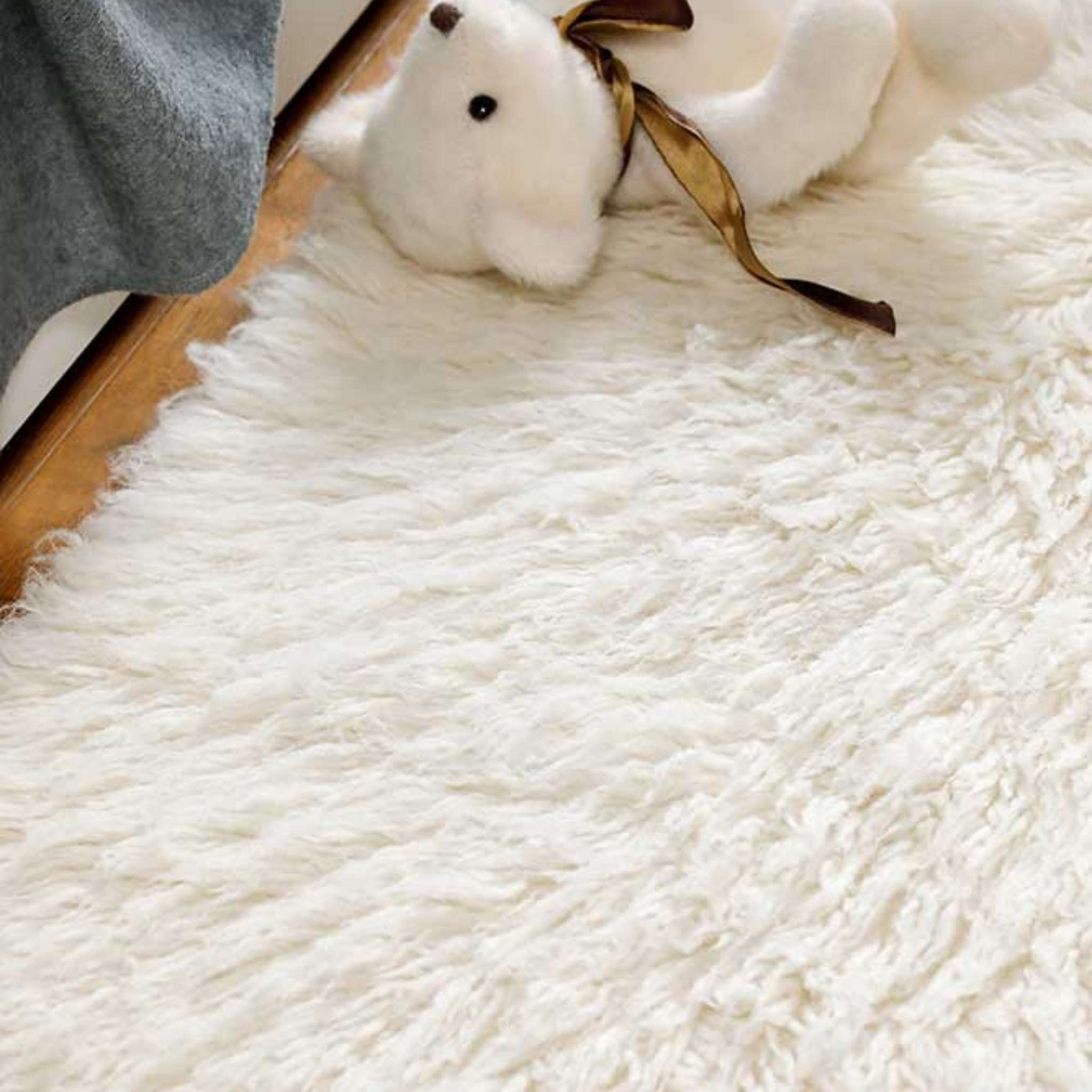Narma FLOKATI Wool rug - White